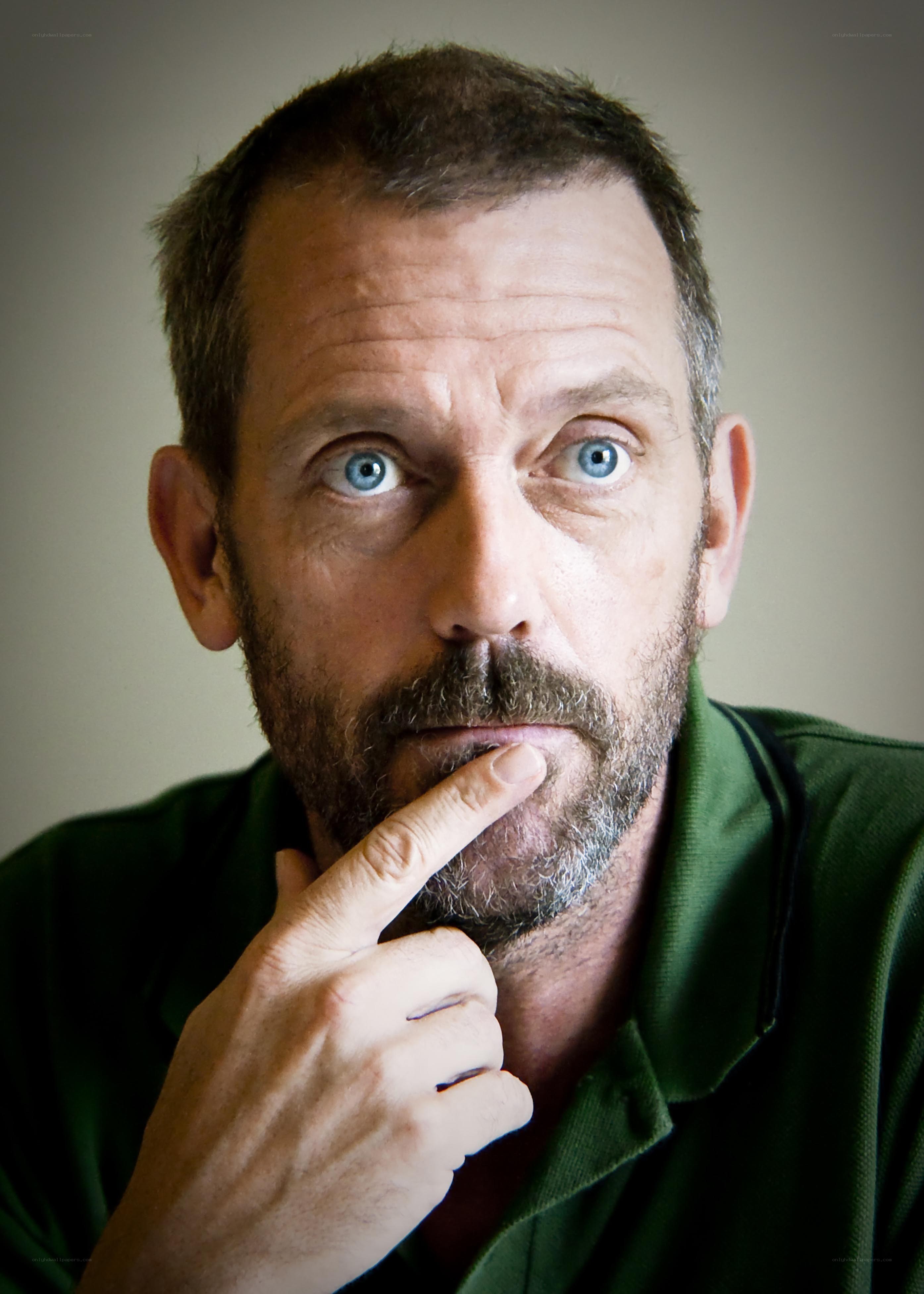 man with finger on chin