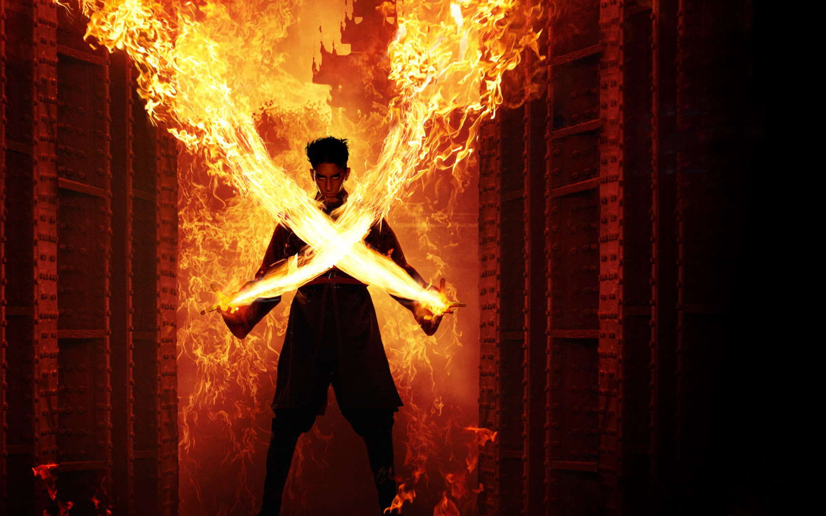 man with fire swords