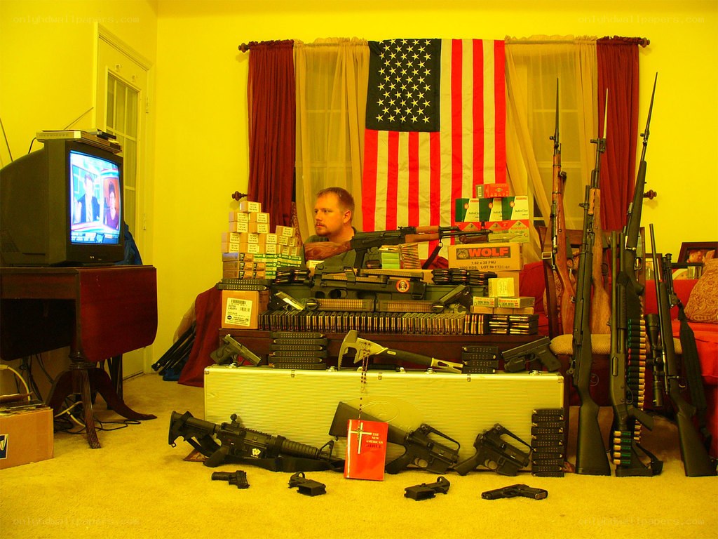 Man with firearms and ammunition