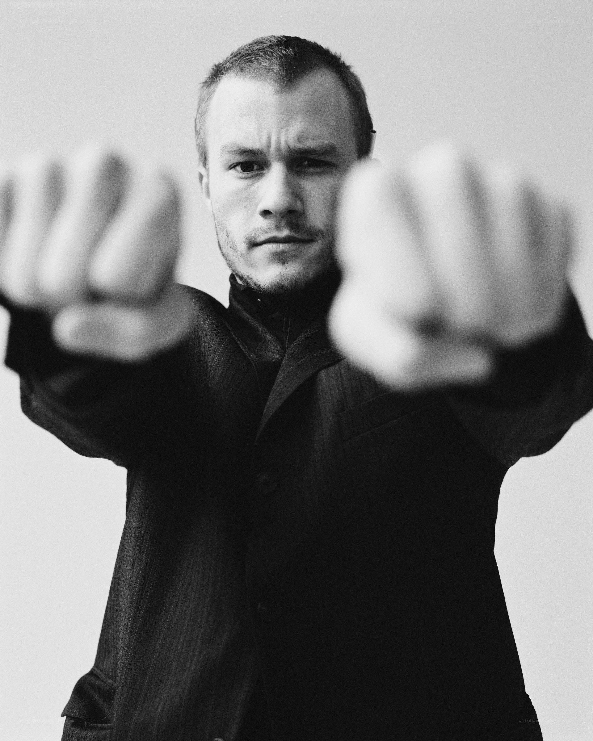 man with fists raised