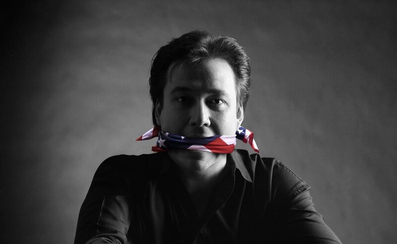 Man with flag gagged