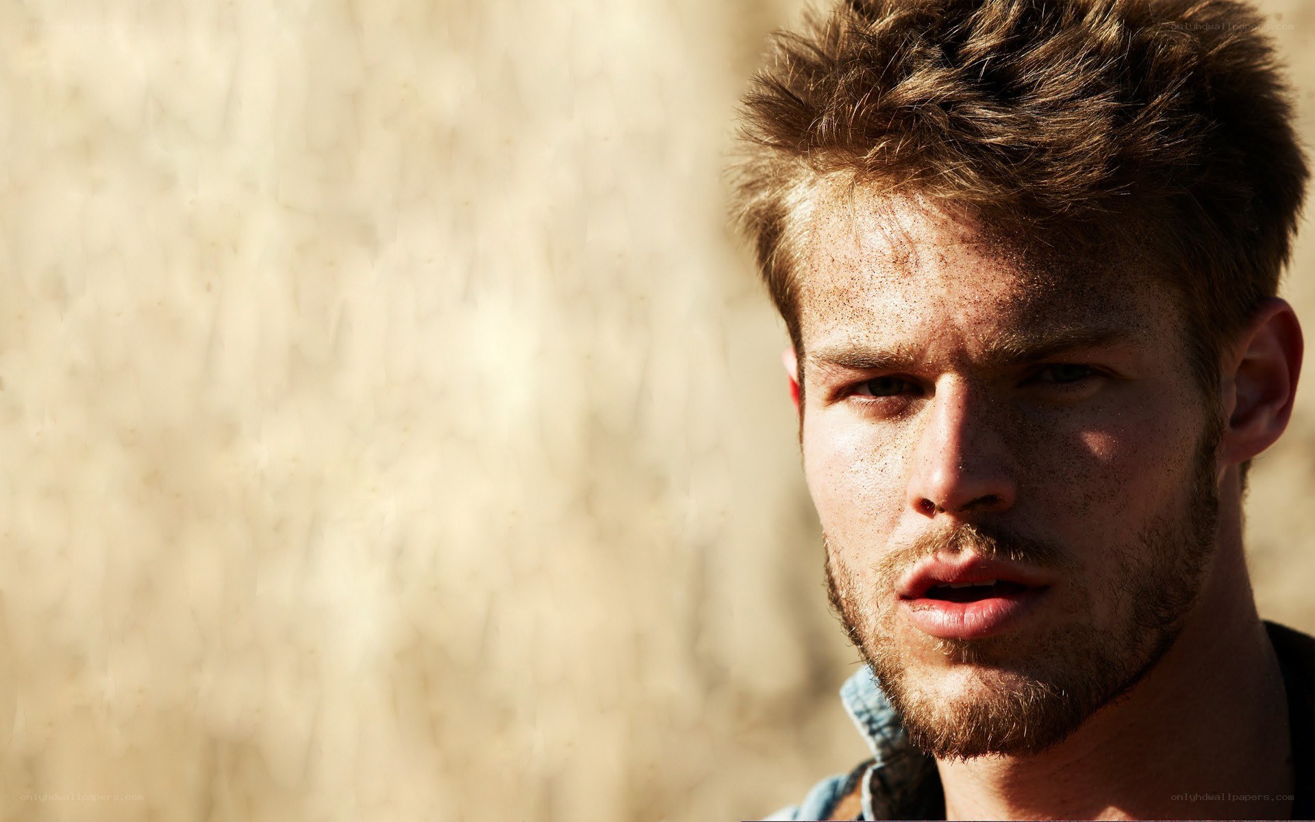 man with freckles in sunlight