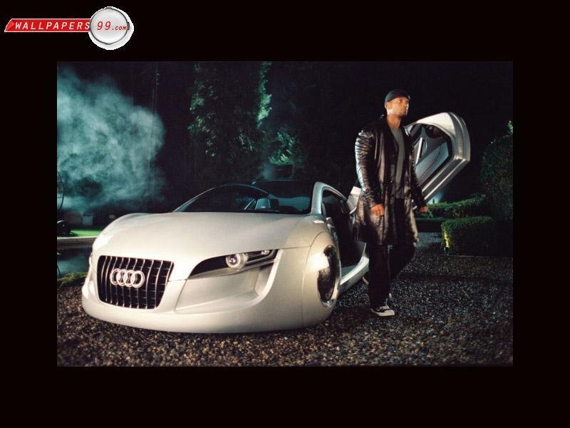 man with futuristic car