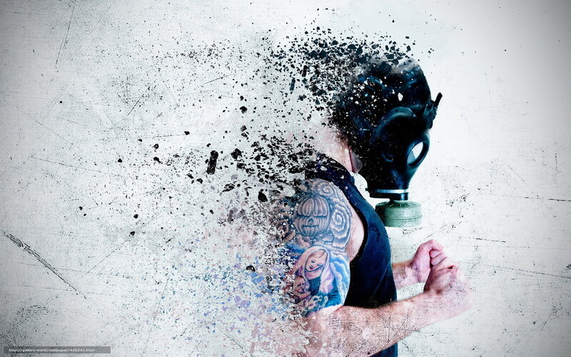man with gas mask and tattoos