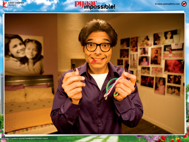 Man with glasses and colorful objects