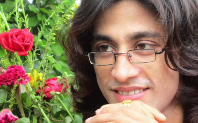 Man with Glasses and Flowers