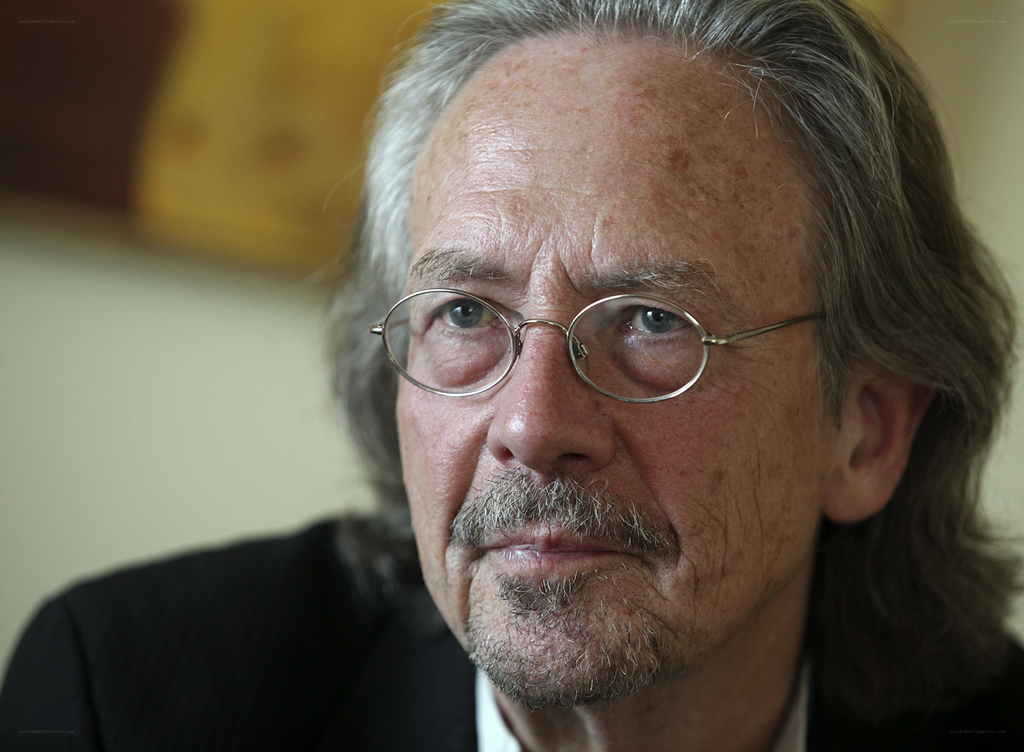 man with glasses and gray hair
