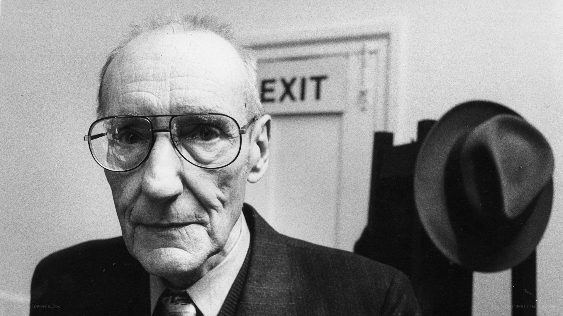 Man with glasses and hat