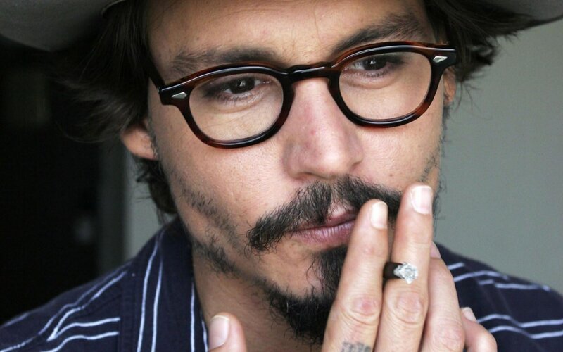 Man with Glasses and Mustache — Black, Contemplative