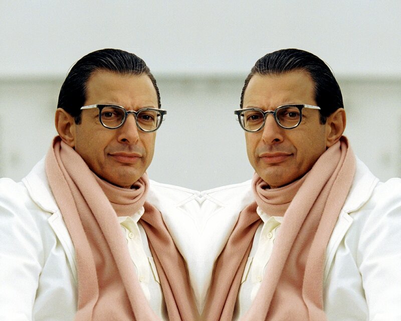 Man with glasses and scarf