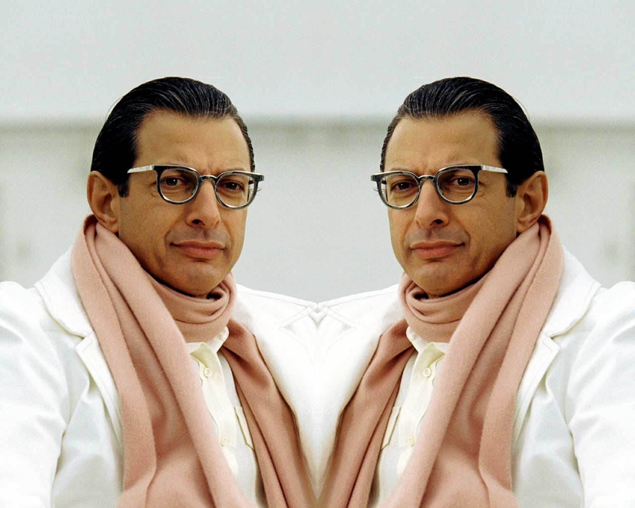 Man with glasses and scarf