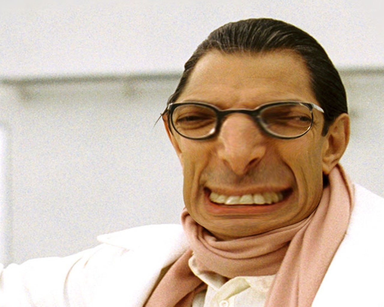 man with glasses and scarf