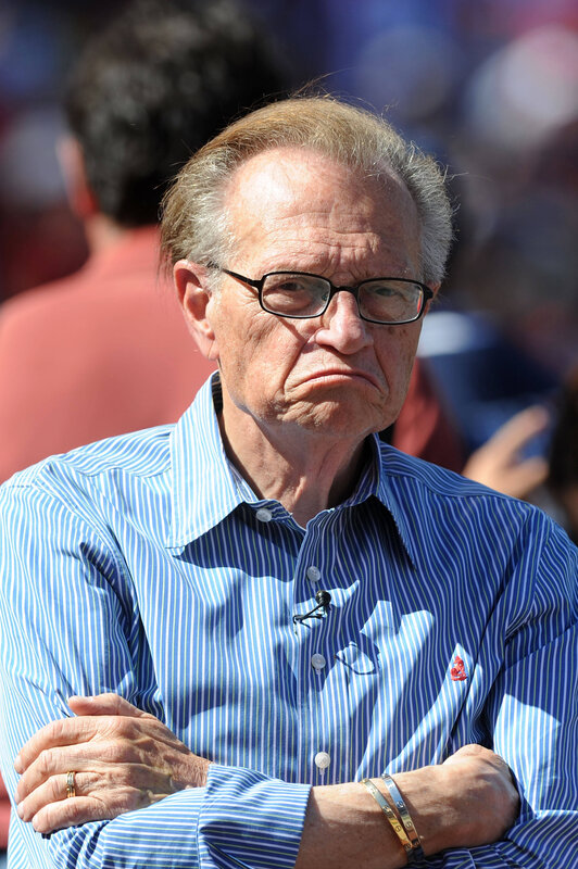 man with glasses and striped shirt