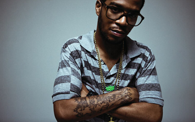 man with glasses and tattoos