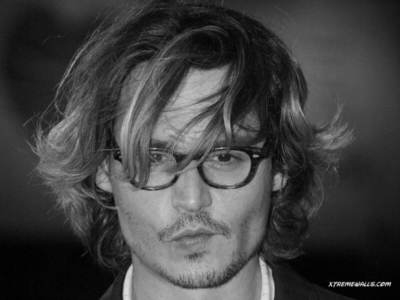 Man with Glasses and Wavy Hair