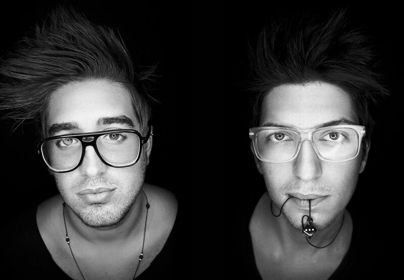 man with glasses in black and white
