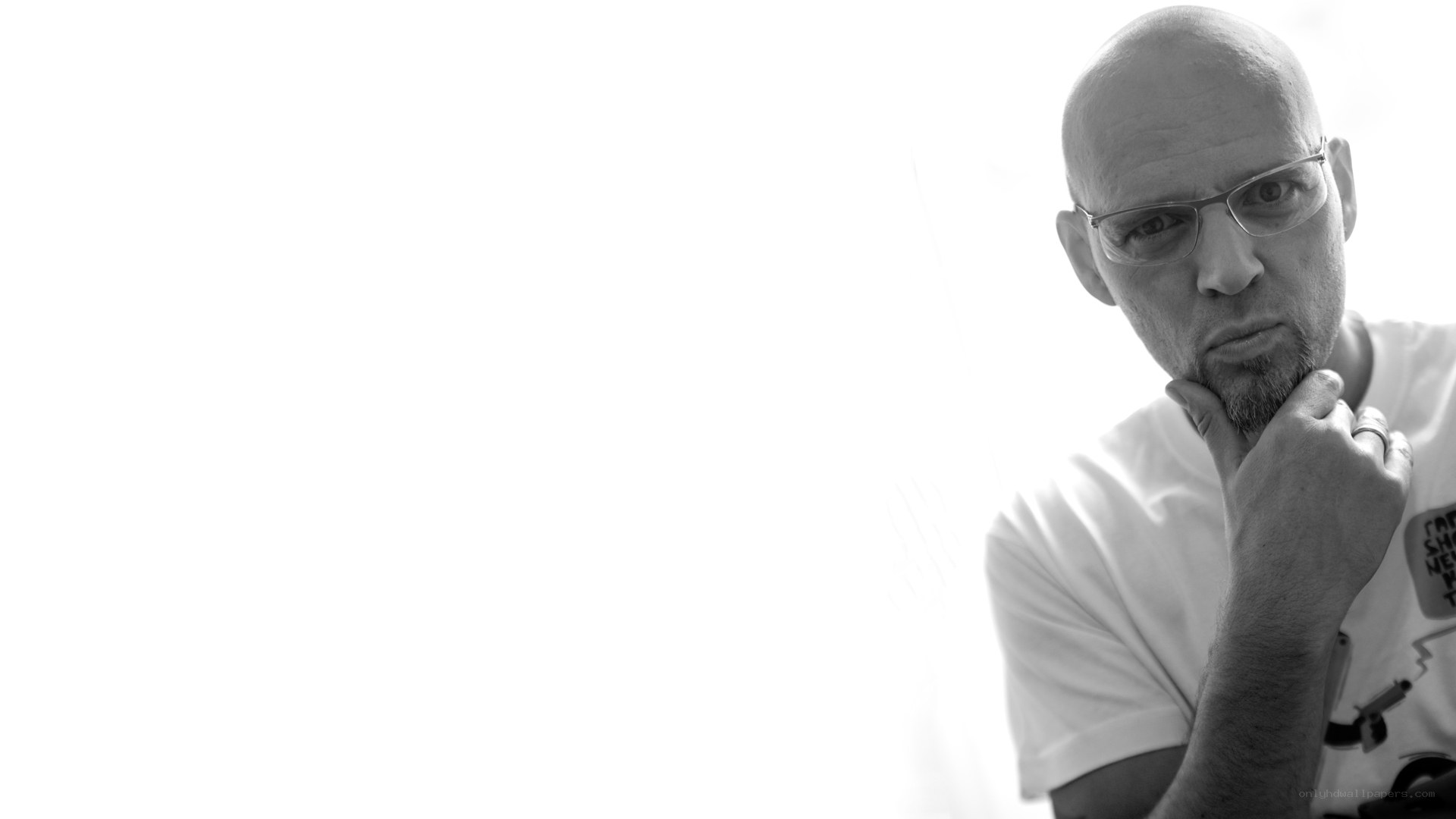 man with glasses in black and white
