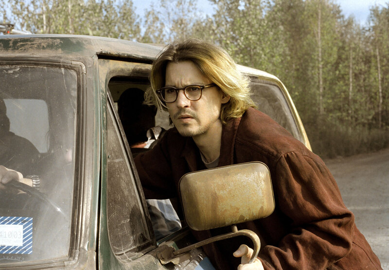 Man with Glasses in Car — Brown