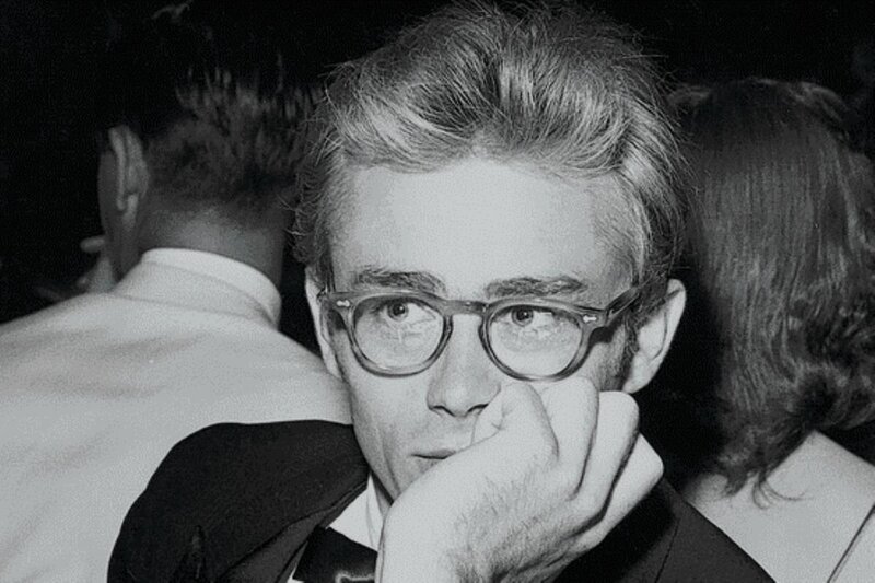 Man with Glasses in Crowd