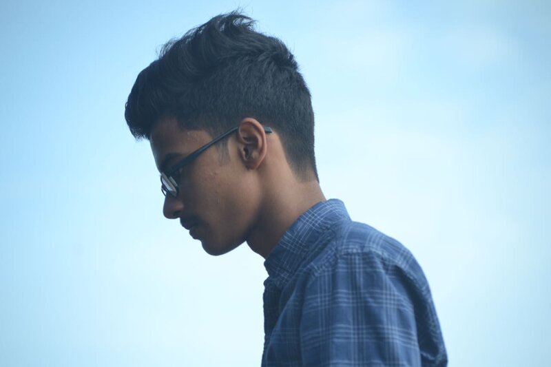 Man with Glasses in Profile — Blue