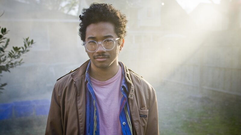 man with glasses in sunlight