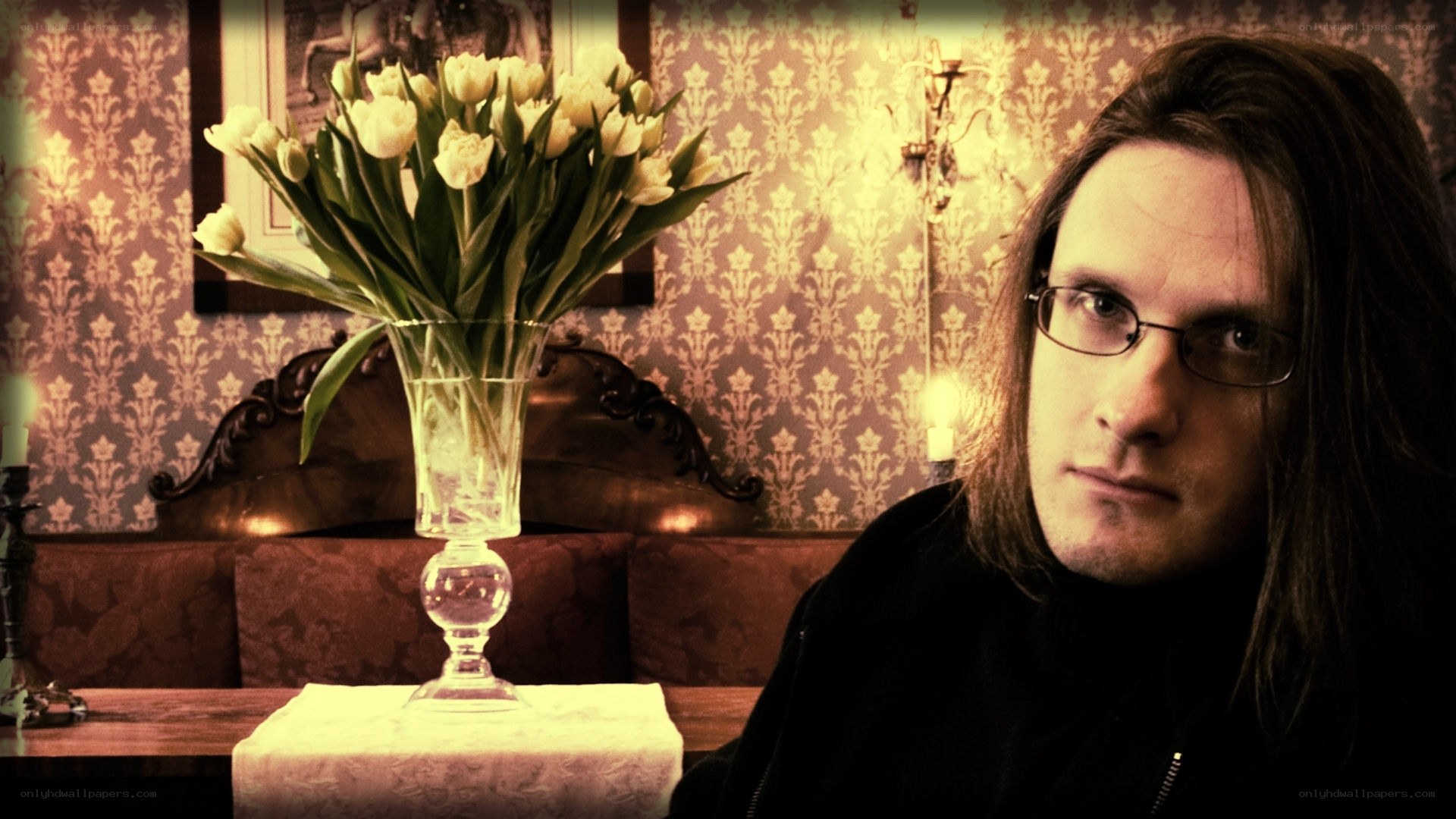 man with glasses in vintage room