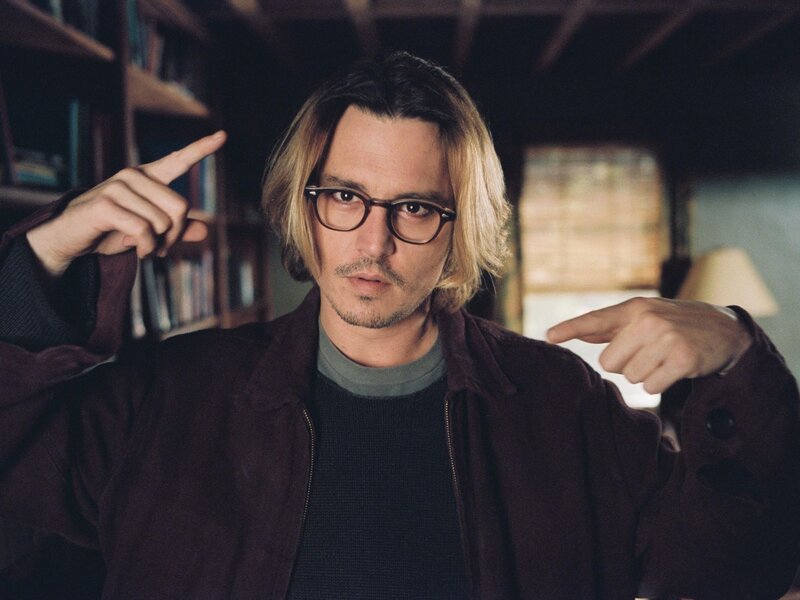 Man with Glasses Pointing