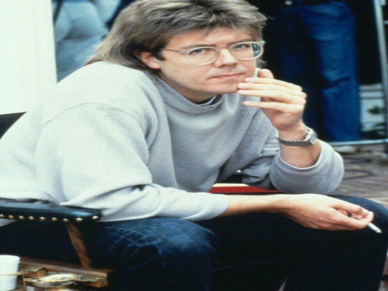 Man with Glasses Sitting