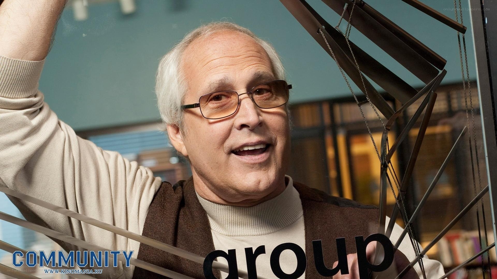 man with glasses smiling