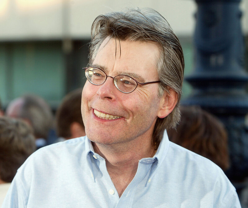 Man with Glasses Smiling — Blue