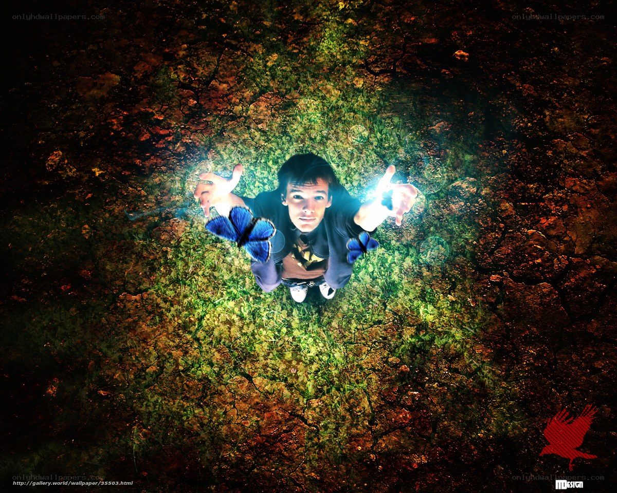 man with glowing hands and butterflies
