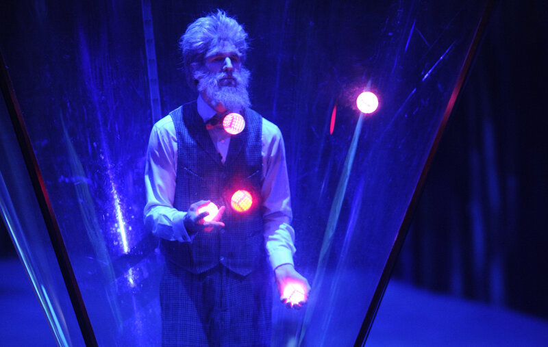 Man with Glowing Orbs