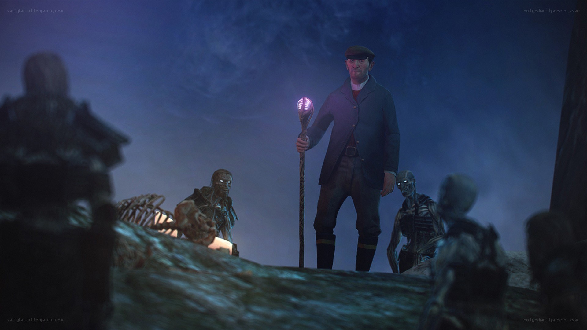 man with glowing staff in cave