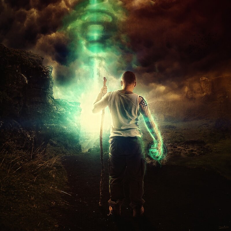 man with glowing staff