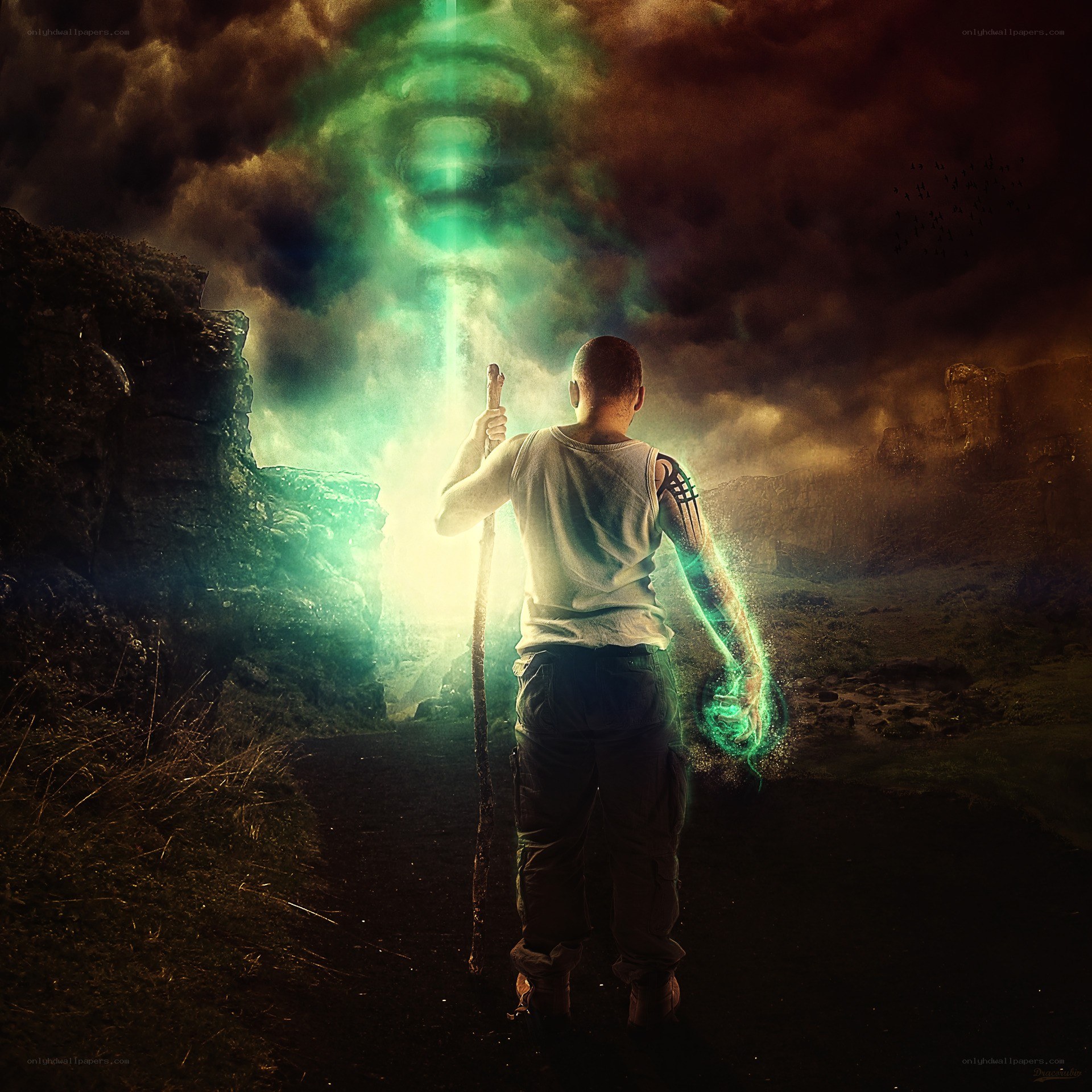 man with glowing staff