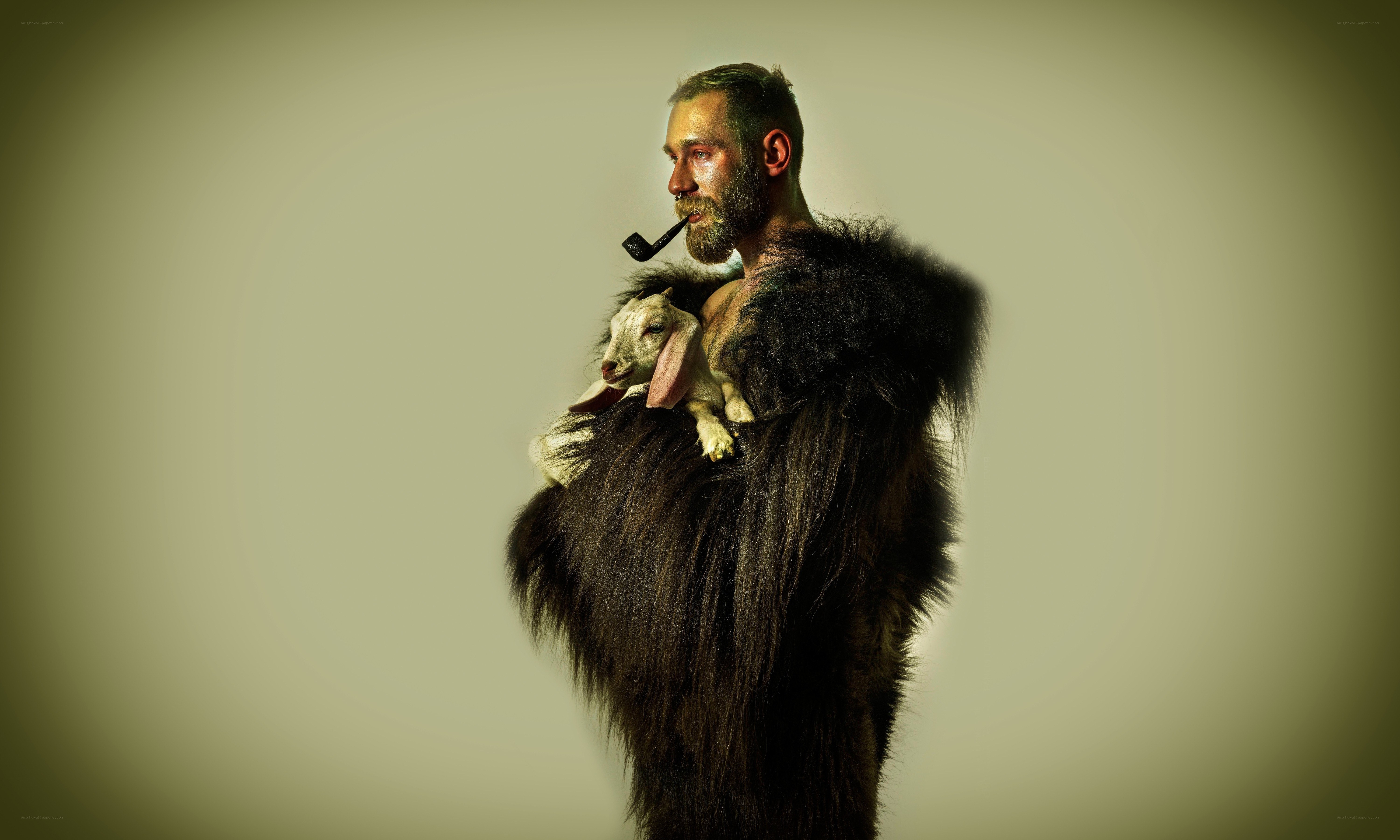 man with goat and pipe