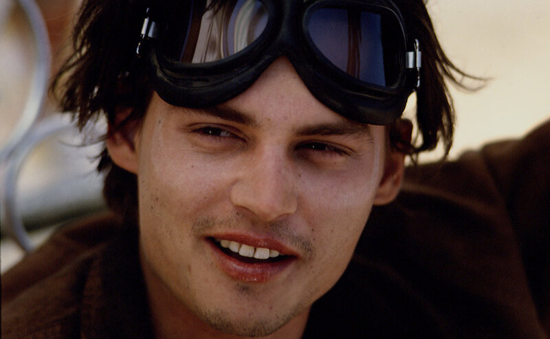 Man with Goggles on Head — Brown