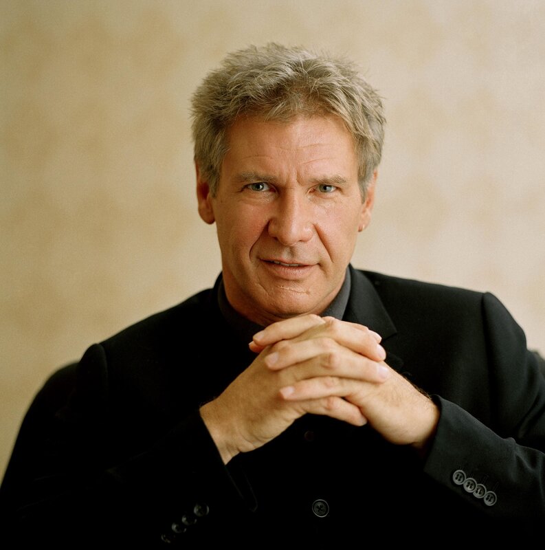 Man with Gray Hair — Black, Neutral, Photograph, Black Jacket, Hands Clasped