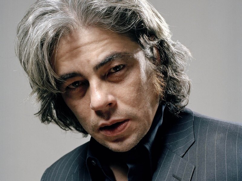 man with gray hair in suit