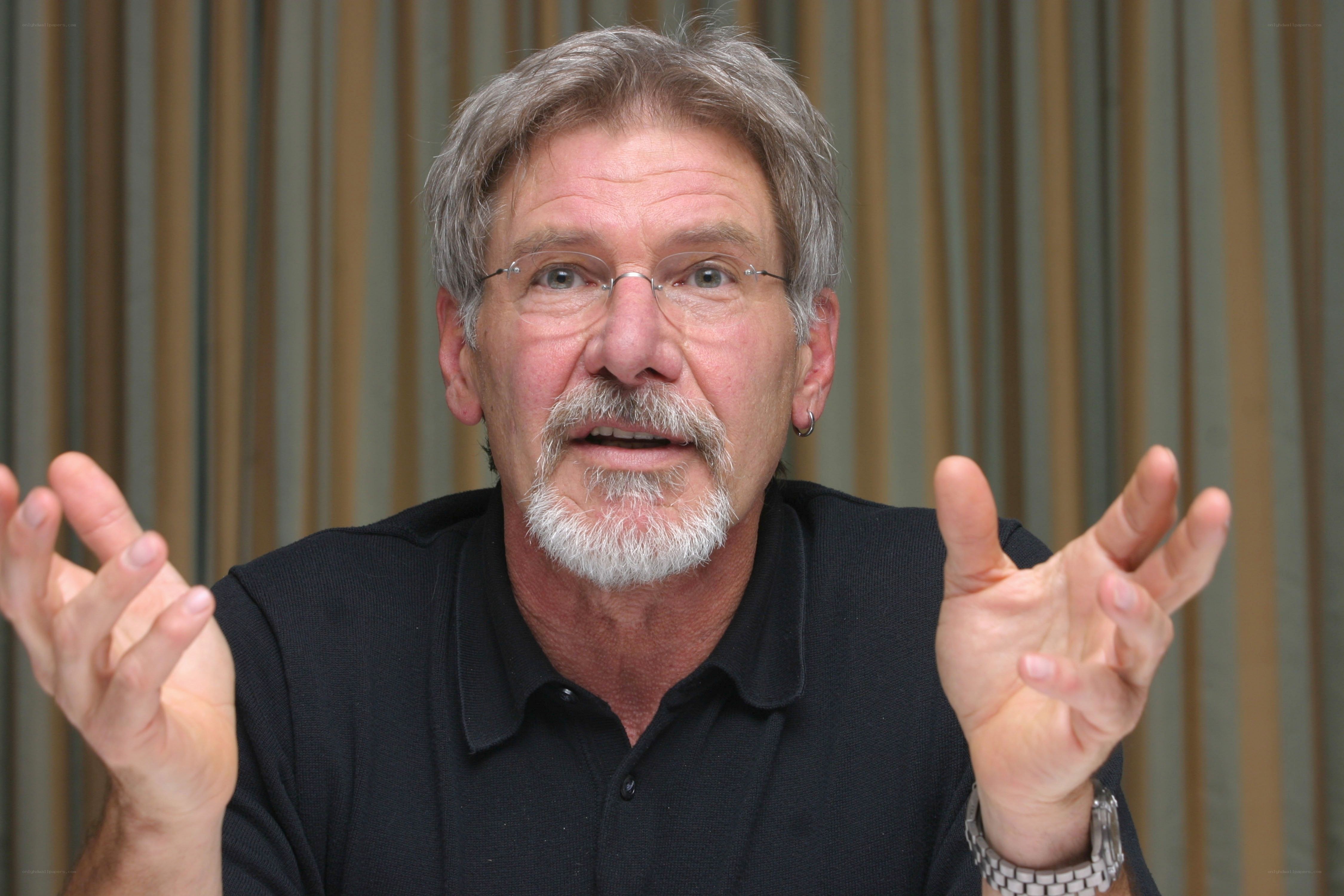 man with gray hair speaking