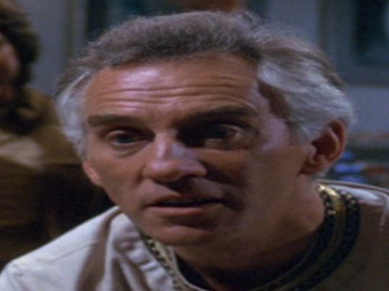 Man with Gray Hair — White, Serious