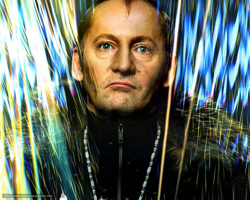 Man with green eyes and colorful background