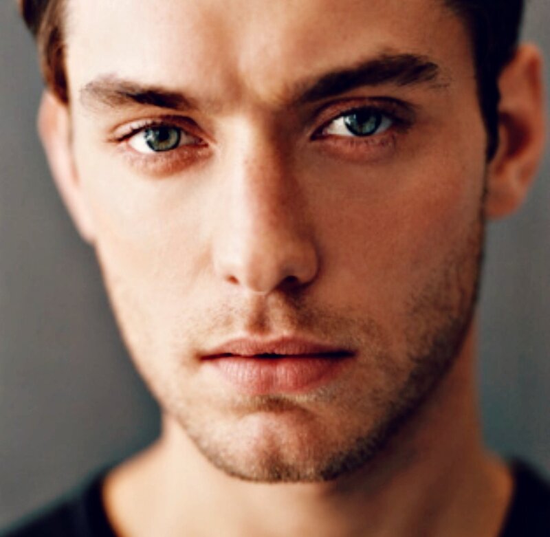 Man with Green Eyes — Brown, Serious, Photograph, Black Shirt