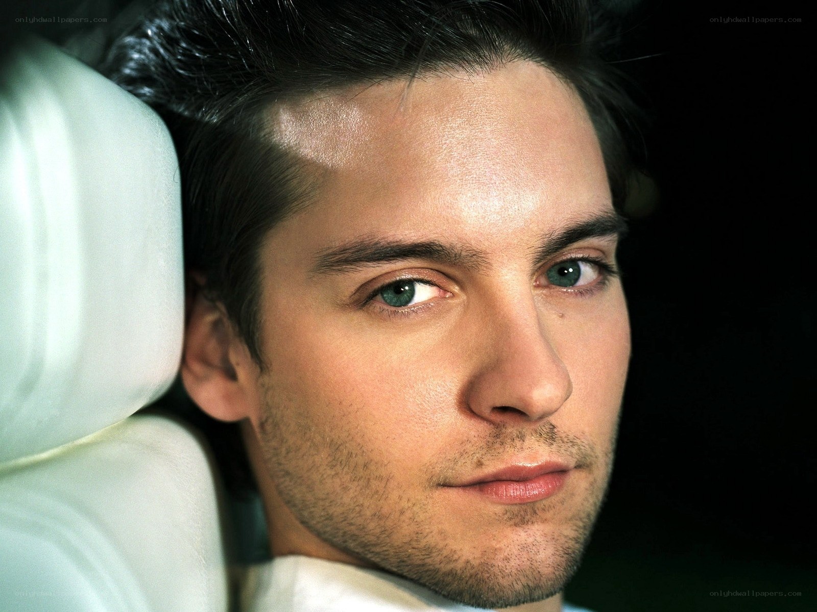 man with green eyes in car
