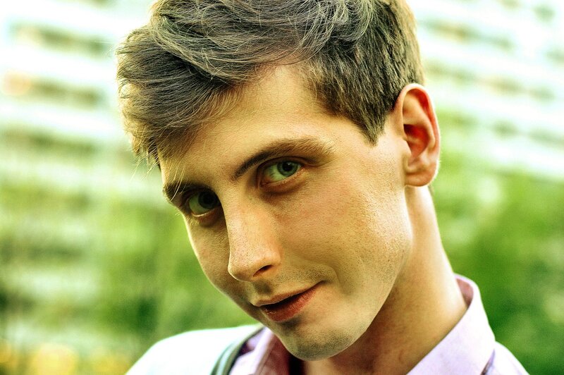 man with green eyes looking at camera