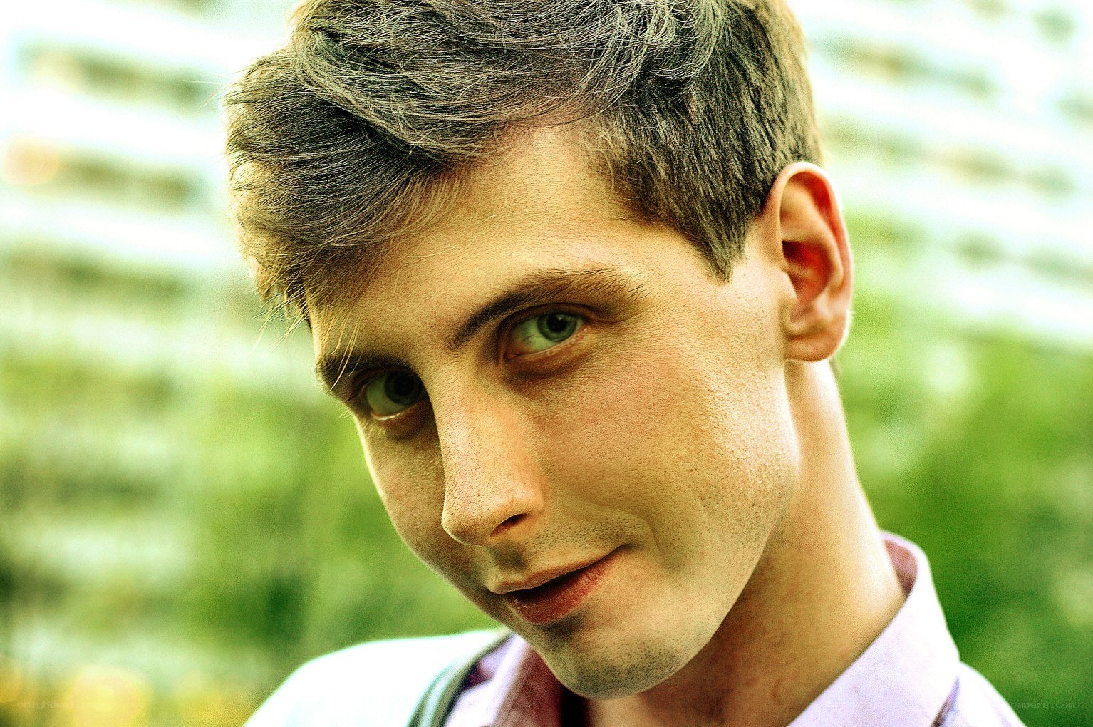 man with green eyes looking at camera