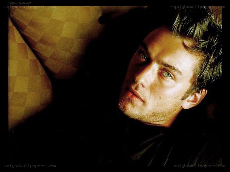 man with green eyes lying down