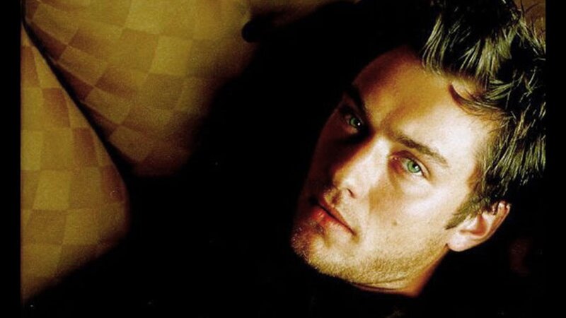 man with green eyes lying down