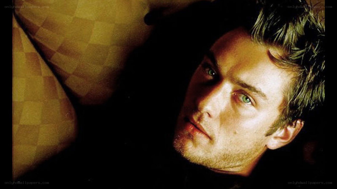 man with green eyes lying down