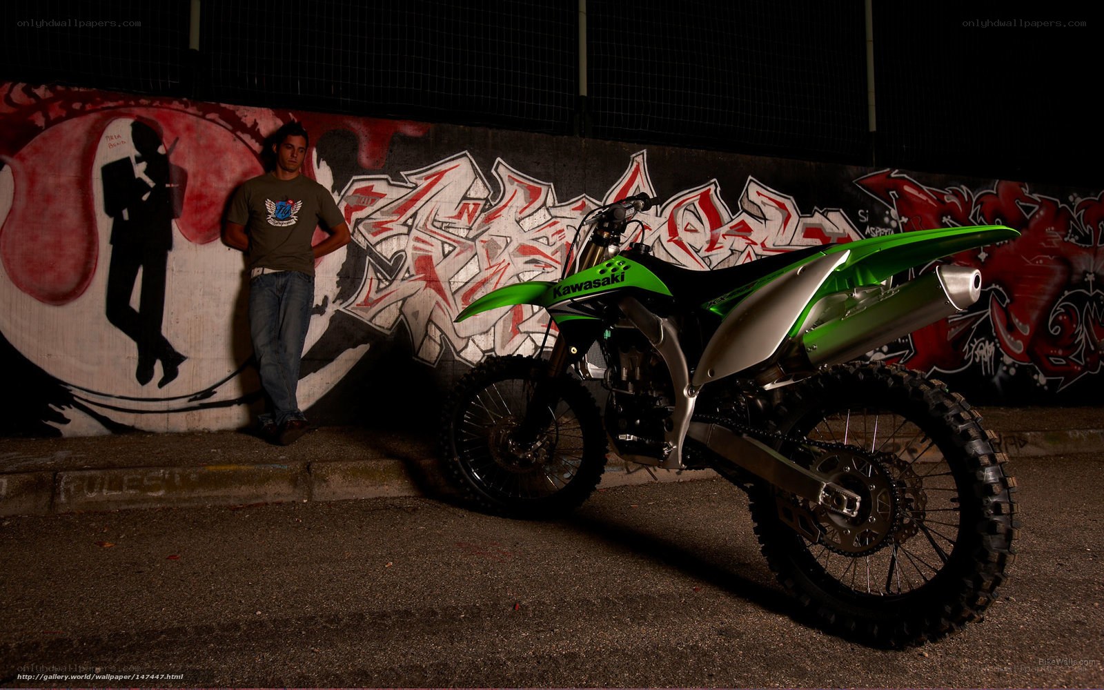 Man with green motorcycle